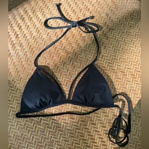 Super cute, strappy bikini top. Reversible and perfect for the pool.